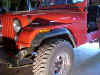 Before view of a stock-sprung CJ and 31" tires.