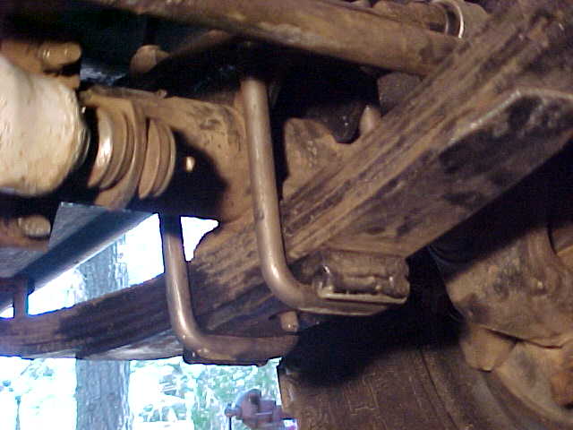 Bottom side view of the U-bolt flip kit showing all that hangs below the springs.